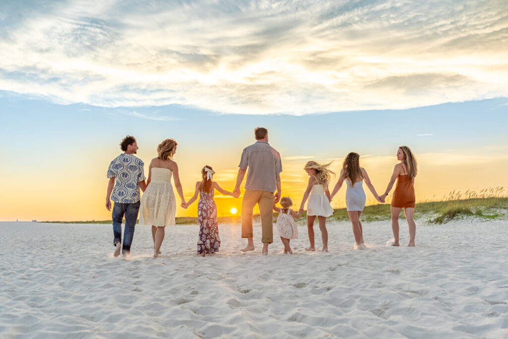 Family gathered together on the beach during a Fotos4Fosters family session