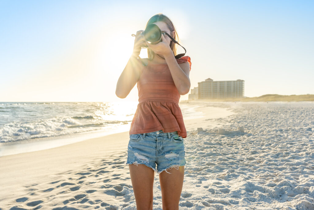 Summer Stone photographing on the beach